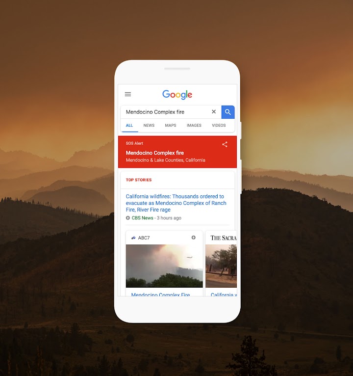 Phone with SOS Alert feature displaying wildfire information