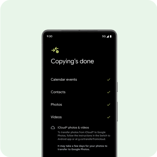 A brand-new Android phone screen with the message 'Transferring data.' along with a list of contacts, photos and videos, calendar events, messages and WhatsApp chats and music listed below.