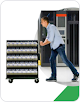 Illustration of a worker pushing a tray of servers