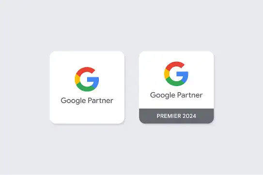 Google Partners バッジと Google Premier Partners バッジの違いがわかるよう、両方が並べられています。