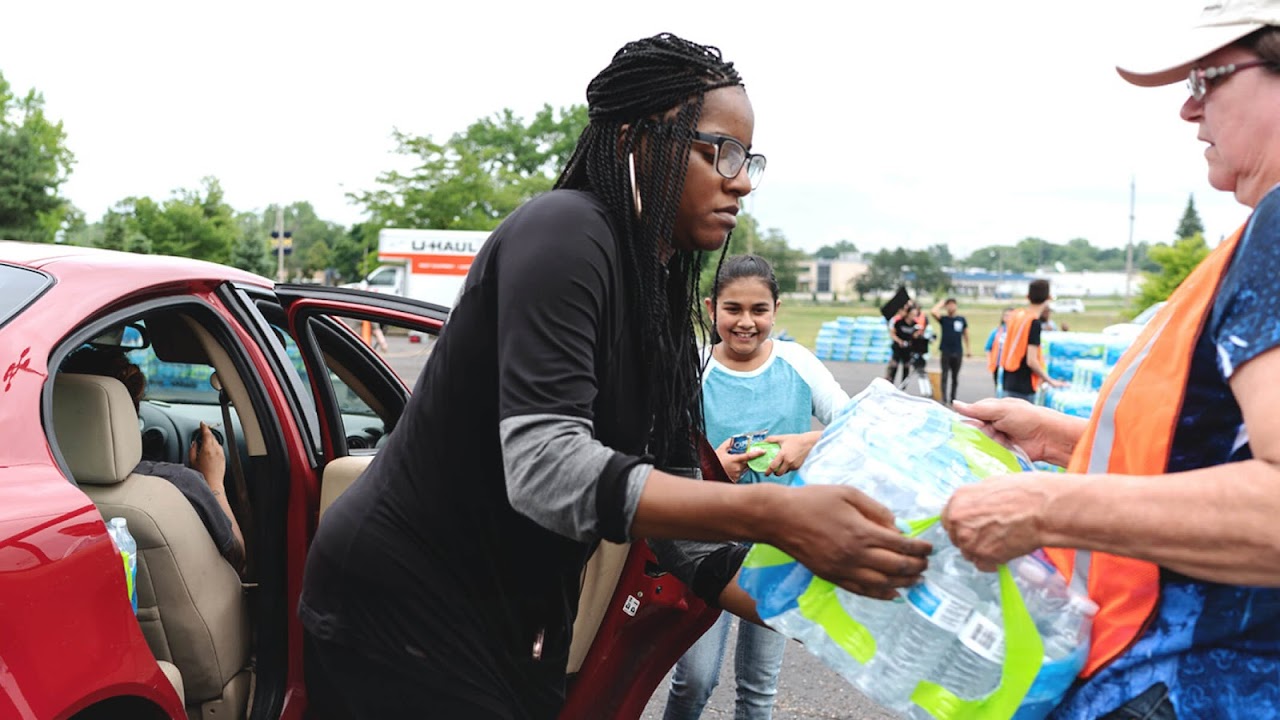Volunteers distributing bottled water in Flint, Michigan.