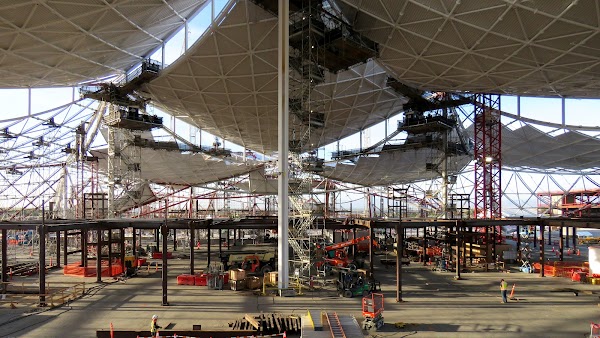 An interior view of scaffolding built from the ground to the top of each peak of the ceiling for construction workers to use at Bay View.