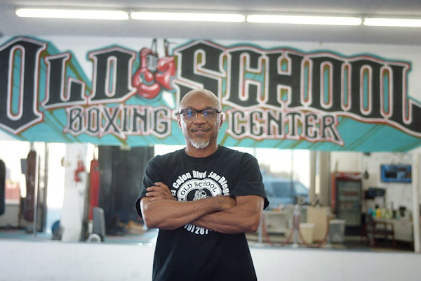 Ernest Johnson, owner of the Old School Boxing and Fitness Center, stands proud in front of his gym.