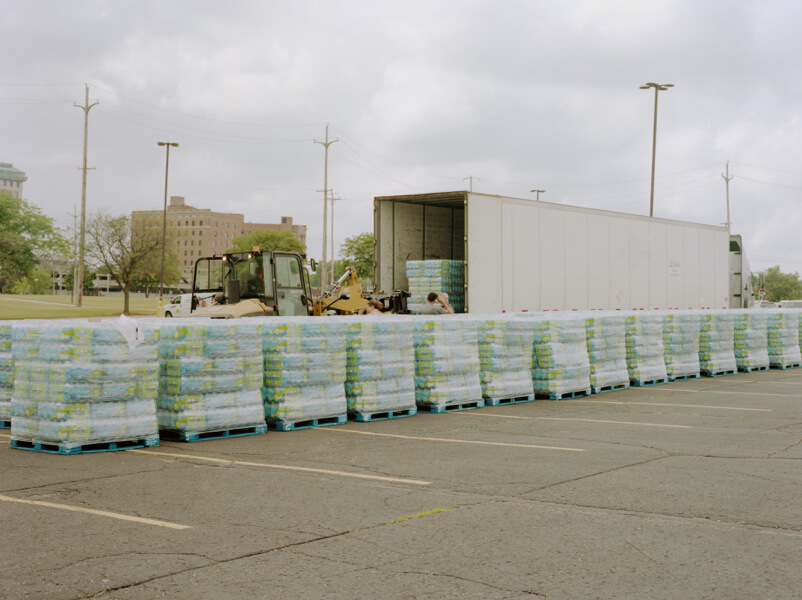 Bottled water distribution in a Flint, Michigan parking lot.