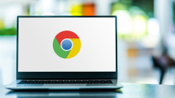 A Chrome logo showing on a laptop screen
