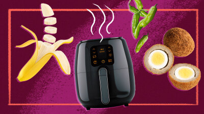 illustration of an air fryer with a banana, shishito peppers, and a scotch egg