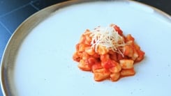 Gnocchetti in tomato sauce on a plate.