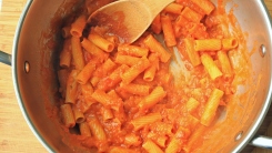 Penne and vodka sauce in a pot.