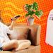 illustration of woman sitting on couch with plant and air conditioner nearby