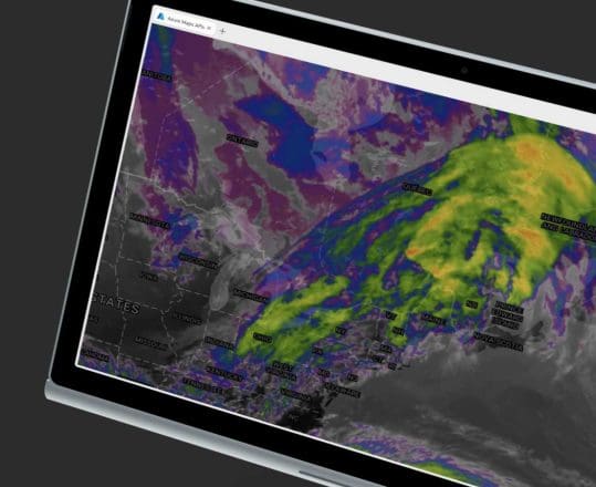 laptop displaying weather data on interactive map