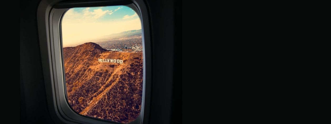 view of Hollywood sign from airplane window
