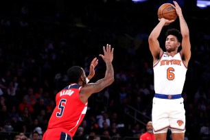 Quentin Grimes shoots during the Knicks' preseason win over the Wizards.