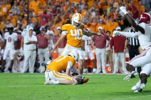 Chase McGrath hits the game-winning 40-yard field goal as time expires to give No. 6 Tennessee a 52-49 upset win over No. 3 Alabama.