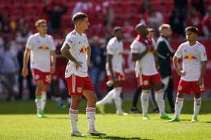 The Red Bulls players look on dejectedly after their season-ending loss to the Cincinnati.