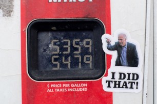 "I Did This," Joe Biden stickers on gas pumps