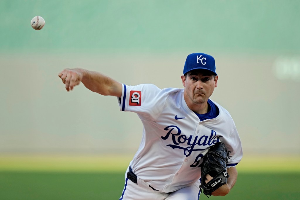 Kansas City Royals starting pitcher Seth Lugo throws during the first inning of a baseball game against the Milwaukee Brewers Tuesday, May 7, 2024, in Kansas City, Mo. 