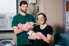 Shellie Pascoe and John Pascoe with their twins. 