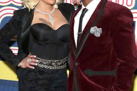 LAS VEGAS, NV - NOVEMBER 17: Faith Evans (L) and her husband Stevie J attend the 2018 Soul Train Awards, presented by BET, at the Orleans Arena on November 17, 2018