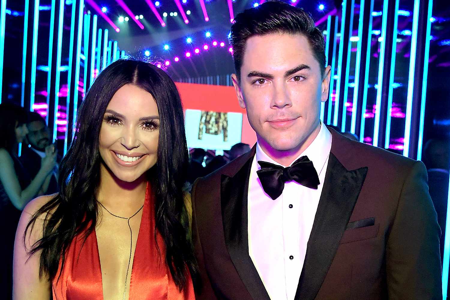 Scheana Shay and Tom Sandoval arrive to the 2018 E! People's Choice Awards held at the Barker Hangar on November 11, 2018