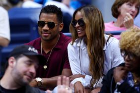 NEW YORK, NEW YORK - SEPTEMBER 02: Russell Wilson of the Denver Broncos and wife Ciara look on prior to the Women's Singles Third Round match between Serena Williams of the United States and Ajla Tomljanovic of Australia on Day Five of the 2022 US Open at USTA Billie Jean King National Tennis Center on September 02, 2022 in the Flushing neighborhood of the Queens borough of New York City. (Photo by Elsa/Getty Images)