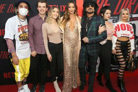 Courtney Sixx, Nikki Sixx and family attend the premiere of Netflix's 'The Dirt" at the Arclight Hollywood on March 18, 2019 in Hollywood, California