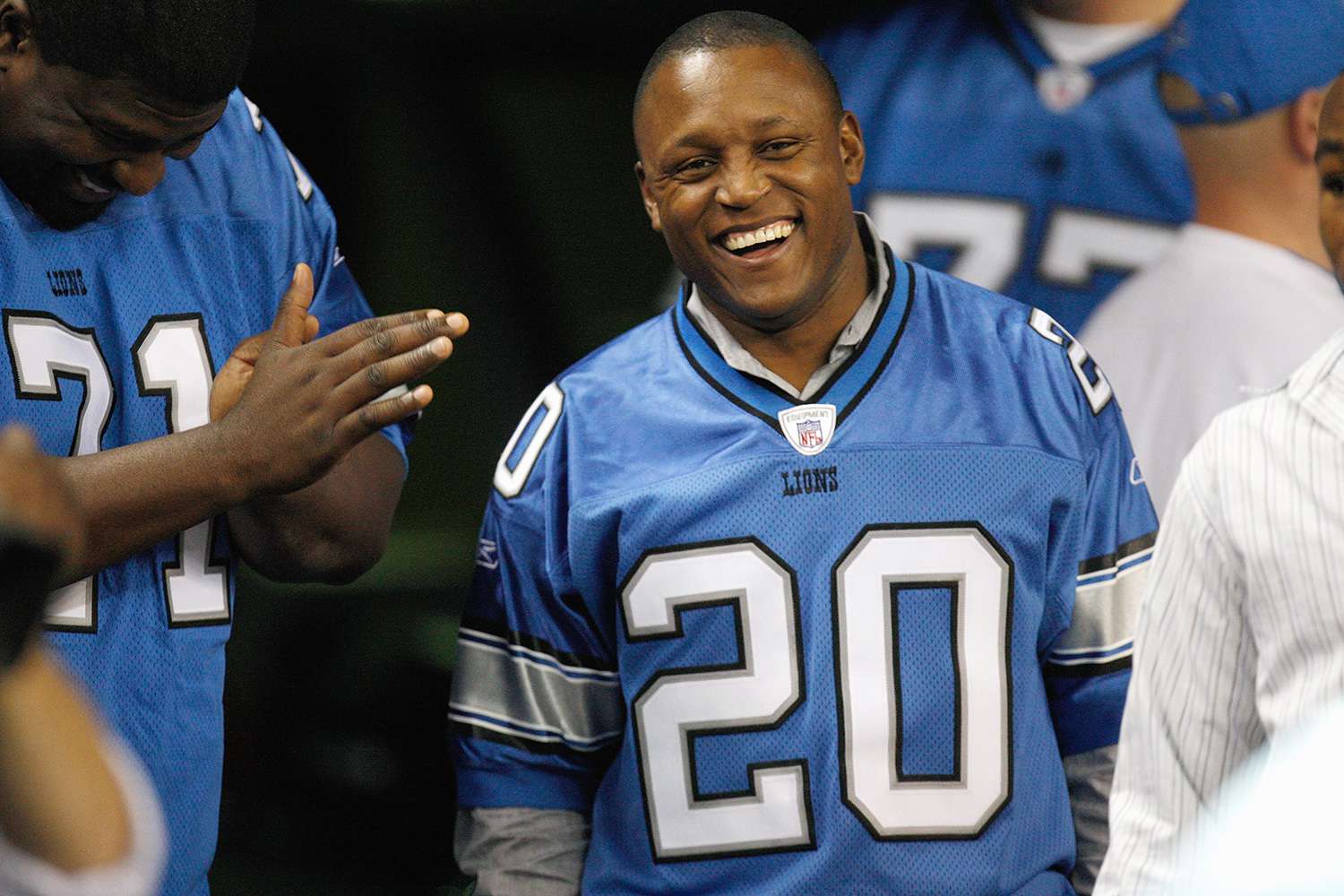 Barry Sanders smiles from the sideline during the game between the Kansas City Chiefs and the Detroit Lions on December 23, 2007 at Ford Field in Detroit, Michigan