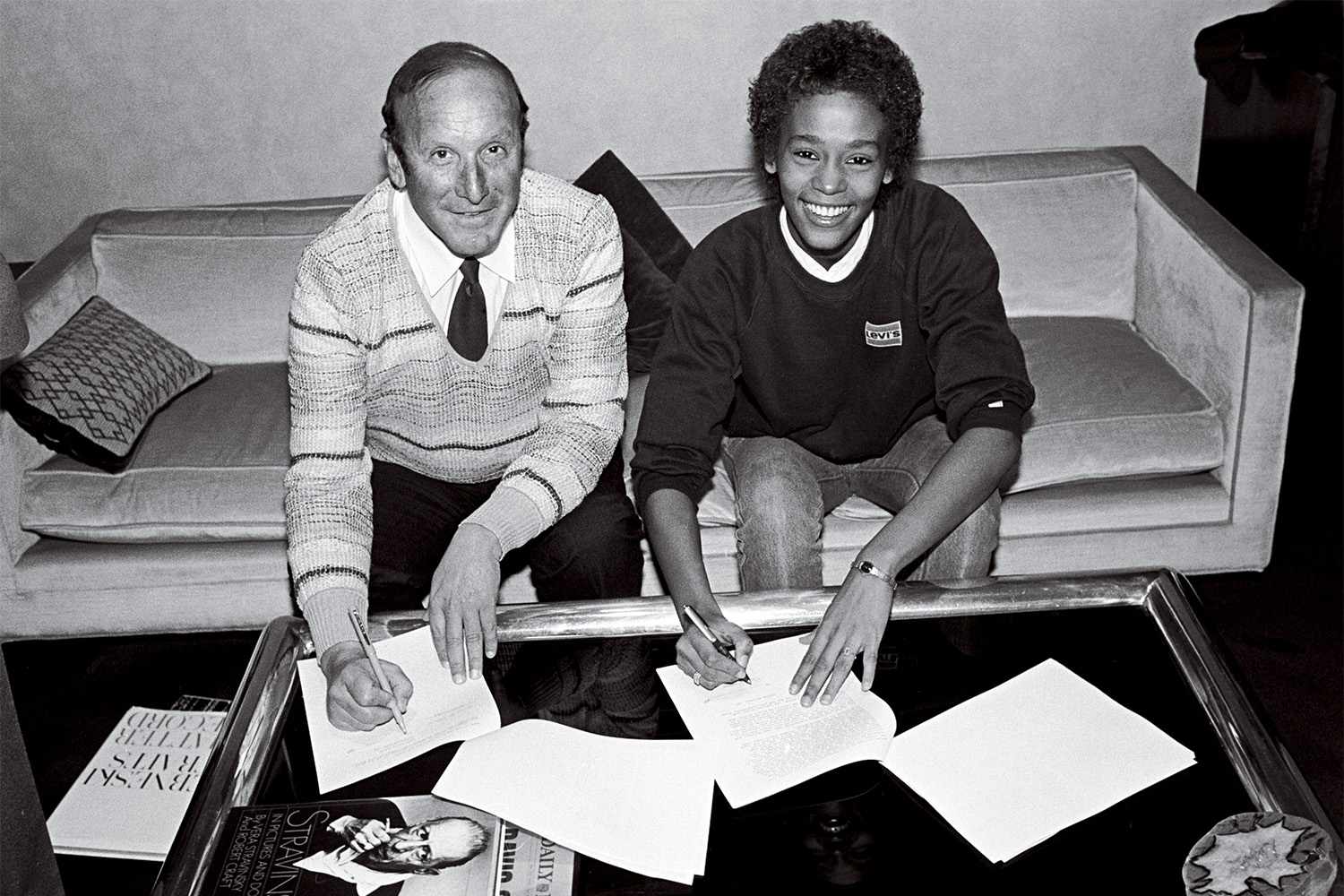 Clive Davis and Whitney Houston photographed at the signing of her contract with Arista Records at the Arista Studio in New York City on April 10, 1983. howard grimes of the hi rhythm section performing at the seventh annual ponderosa stomp at the house of blues held in new orleans, la on april 29, 2008. whitney houston Getty Images