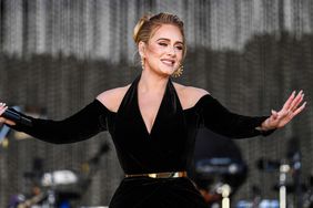 Adele performs on stage