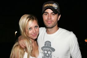 Tennis player Anna Kournikova and singer Enrique Iglesias leave Big Pink restaurant during the early morning hours on June 16, 2006