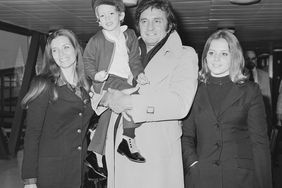 Johnny Cash, June Carter Cash, John Carter Cash, and Cindy Cash at Heathrow airport in London on September 25, 1972.