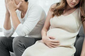 Pregnant couple seem stressed