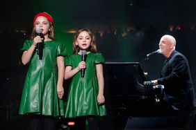  Billy Joel (R) performs with his daughters Della Joel and Remy Joel at Madison Square Garden