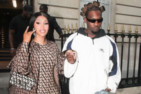 Cardi B and offset coming out the Balenciaga store in Paris