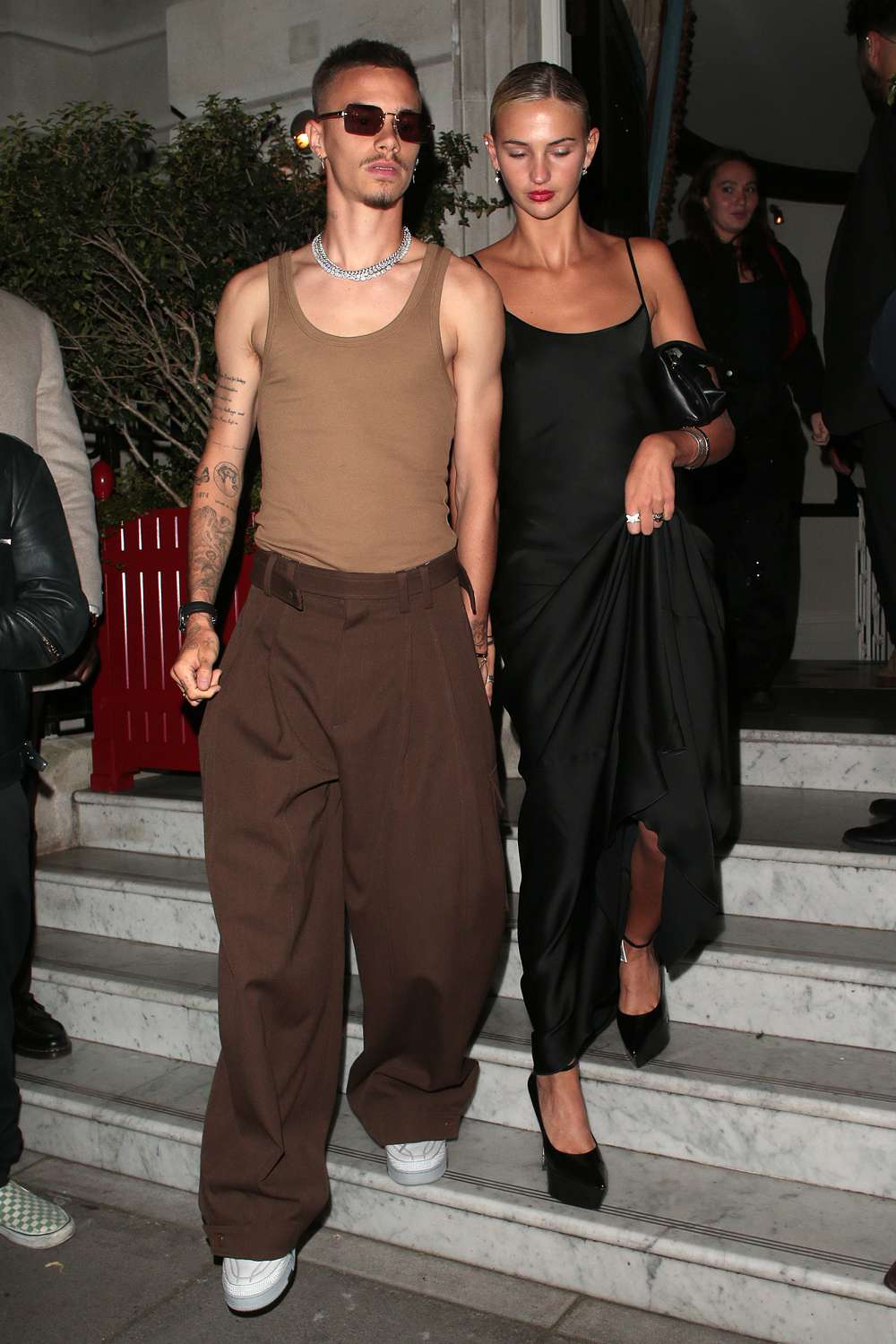 Romeo Beckham and Mia Regan seen attending Beckham - UK TV premiere after party at The Twenty Two on October 03, 2023