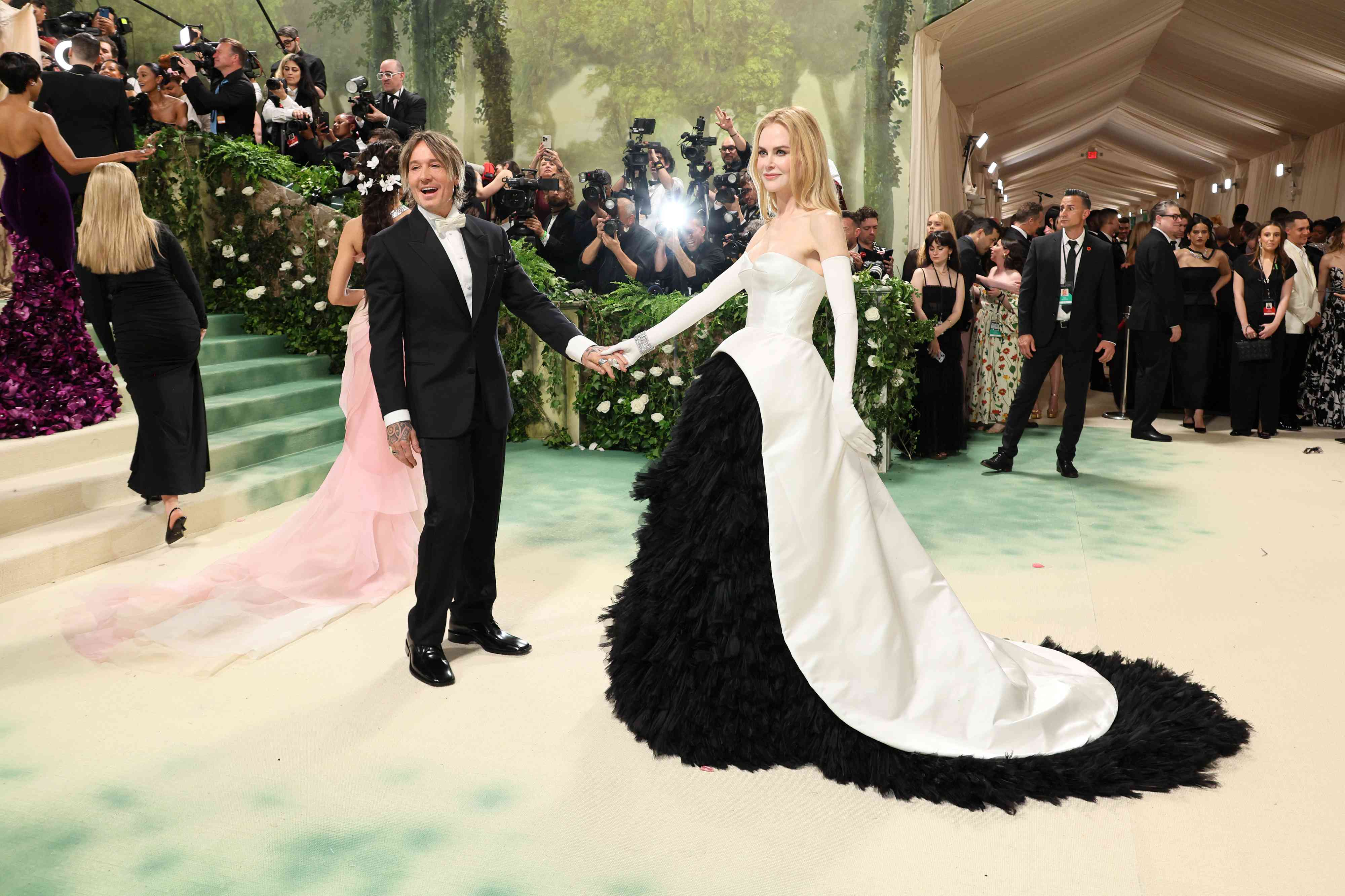 Keith Urban in Black Tuxedo and Nicole Kidman in Black and White Off-the-Shoulder Gown on the Met Gala 2024 Red Carpet