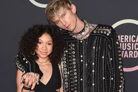 Casie Colson Baker and Machine Gun Kelly attend the 2021 American Music Awards at Microsoft Theater on November 21, 2021 in Los Angeles, California