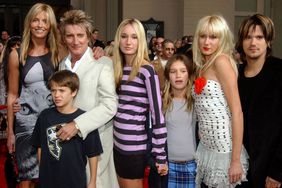 Rod Stewart and Penny Lancaster (L) and his family