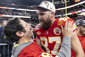 Travis Kelce #87 of the Kansas City Chiefs celebrates with Actor Paul Rudd following the NFL Super Bowl 58 football game between the San Francisco 49ers and the Kansas City Chiefs