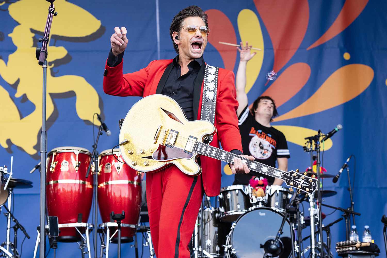 John Stamos of The Beach Boys performs on Day 1 of 2024 New Orleans Jazz & Heritage Festival 