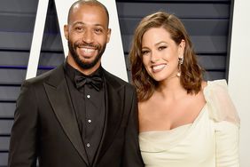 Justin Ervin and Ashley Graham attend the 2019 Vanity Fair Oscar Party hosted by Radhika Jones at Wallis Annenberg Center for the Performing Arts on February 24, 2019 in Beverly Hills, California