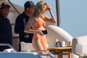 Brittany Mahomes shows off her curves in a tiny orange bikini while out on a boat with her girlfriends in Cabo San Lucas, Mexico!