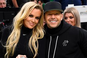 Jenny McCarthy and Donnie Wahlberg attend the game between the Philadelphia 76ers and the Boston Celtics on December 1, 2023 at the TD Garden in Boston, Massachusetts. 