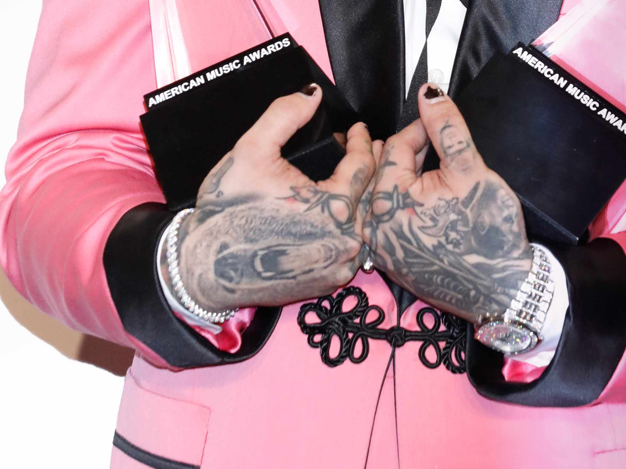 Post Malone (tattoo detail) photographed in the press room of the 2018 American Music Awards at the Microsoft Theater on October 9, 2018 in Los Angeles, California