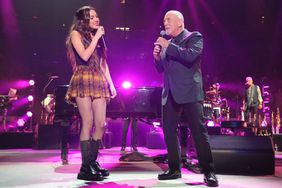 Olivia Rodrigo and Billy Joel perform "Deja Vu" and "Uptown Girl" onstage at Madison Square Garden