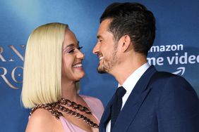 British actor Orlando Bloom and US singer/songwriter Katy Perry arrive for the Los Angeles premiere of Amazon Original Series "Carnival Row" at the TCL Chinese theatre on August 21, 2019 in Hollywood