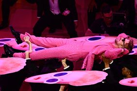 Canadian actor Ryan Gosling (C) performs "I'm Just Ken" from "Barbie" onstage during the 96th Annual Academy Awards at the Dolby Theatre in Hollywood, California on March 10, 2024.