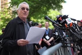 US actor Robert De Niro speaks in support of US President Joe Biden outside of Manhattan Criminal Court as former US President and Republican presidential candidate Donald Trump attends his criminal trial for allegedly covering up hush money payments in New York City, on May 28, 2024.