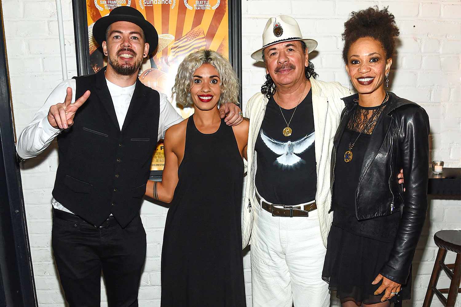 NEW YORK, NY - AUGUST 21: Executive Producer Carlos Santana with wife Cindy Blackman, daughter Stella Santana and her husband attend the "Dolores" New York Premiere at The Metrograph on August 21, 2017 in New York City. (Photo by Jamie McCarthy/Getty Images)