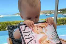 Paris Hiltonâs Son Phoenix Plays with Her Memoir During St. Barts Vacation