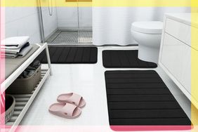 Three bathmats we recommend on a bathroom floor with a colorful border